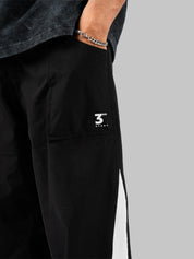 Black parachute pants - Third Story